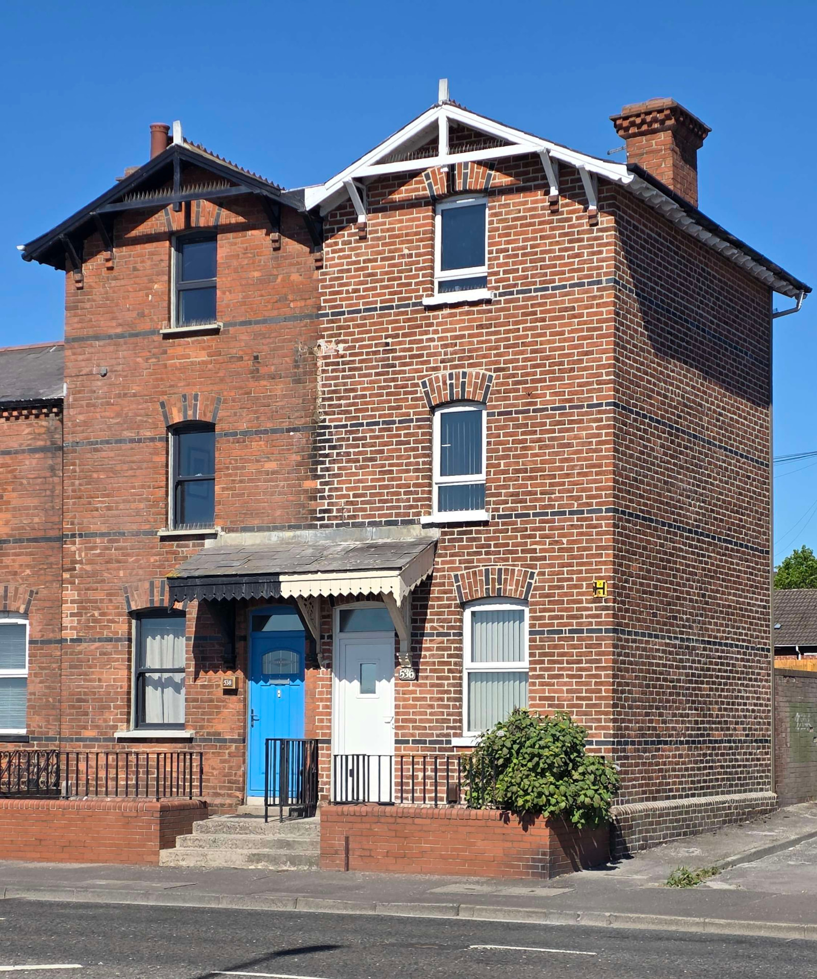 Red brick house with lime mortar repointing